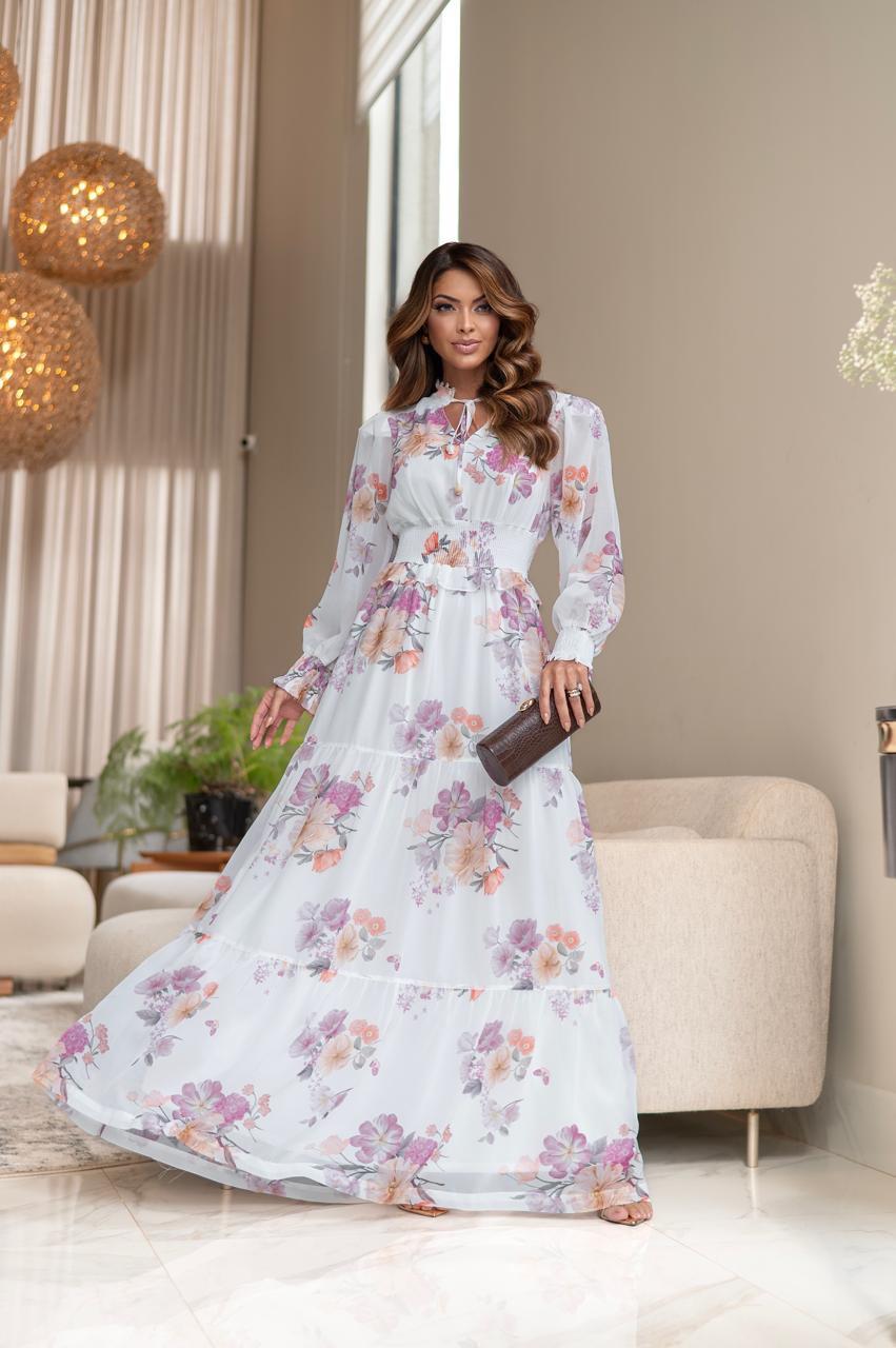 Vestido confeccionado em 100% poliéster, com acabamento delicado